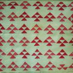 New England crib quilt in printed cottons - excellent conditon.    43" x 36 1/2" 